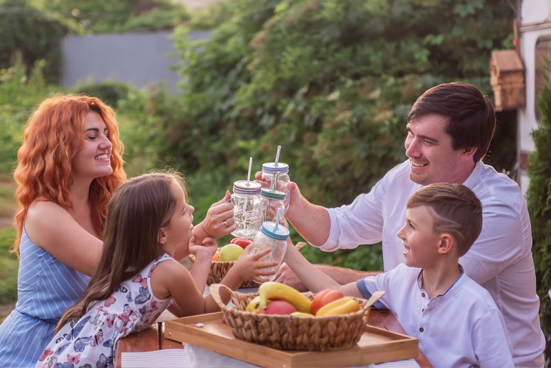 A family drinking filtered water at home